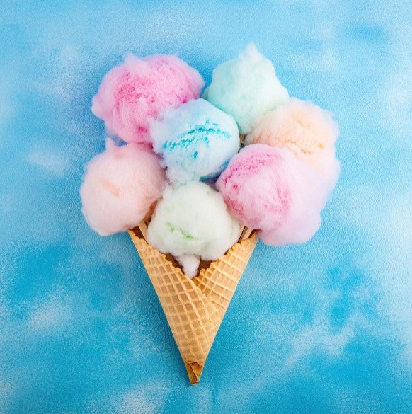 a cone of ice cream on a blue background