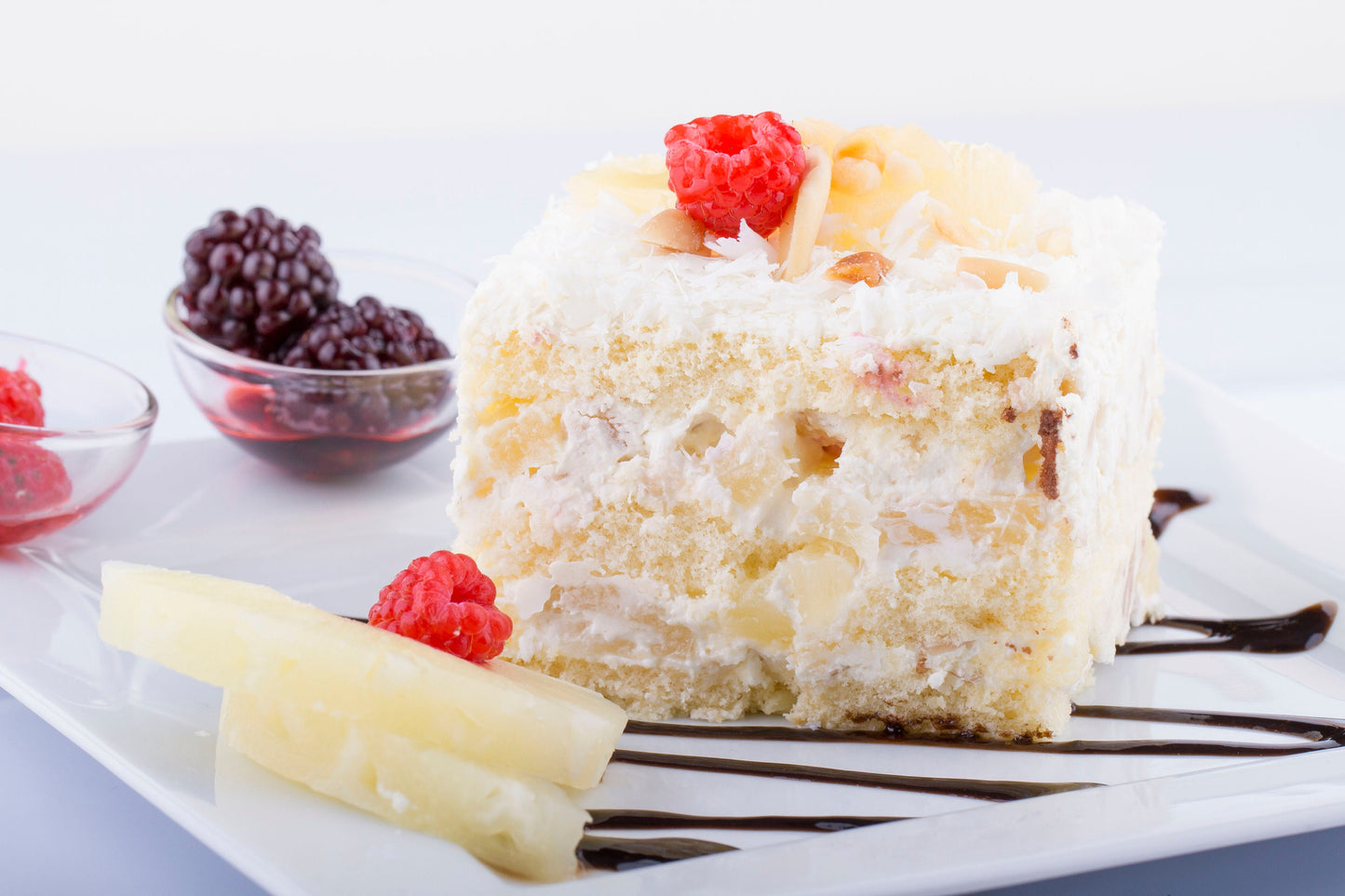 Coconut Pineapple Cake - Moist Yellow Cake, Juicy Pineapple Filling and Sweet Coconut - Indulge in the Tropical Escape